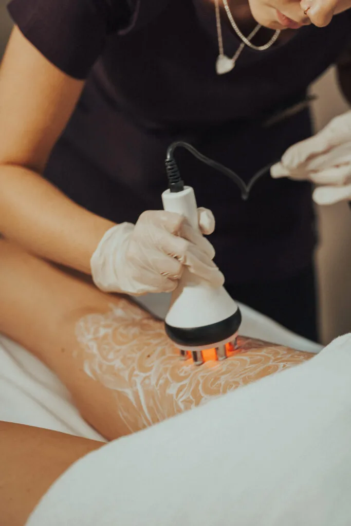 A body-contouring treatment being carried out at the sanctuary